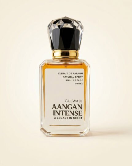A bottle of Aangan Intense, a luxurious unisex oriental perfume with rich notes of oud and leather.
