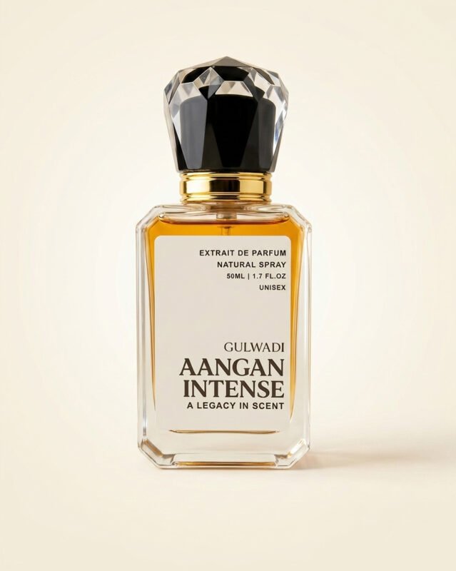 A bottle of Aangan Intense, a luxurious unisex oriental perfume with rich notes of oud and leather.