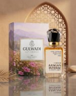 A bottle of Aangan Intense, a luxurious unisex oriental perfume with rich notes of oud and leather.
