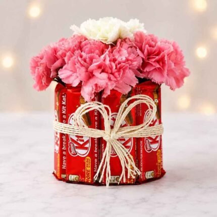 A beautiful KitKat and flower gift, available for KitKat bouquet delivery Lahore.