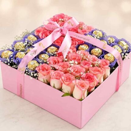 A luxurious gift box featuring pink roses and chocolates for Rose and chocolate delivery Lahore.