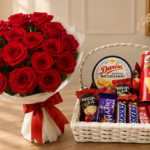 A beautiful red rose bouquet and a gourmet snack basket for Gift delivery Lahore.