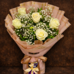 White rose and Chocolate bouquet Lahore gift arrangement.