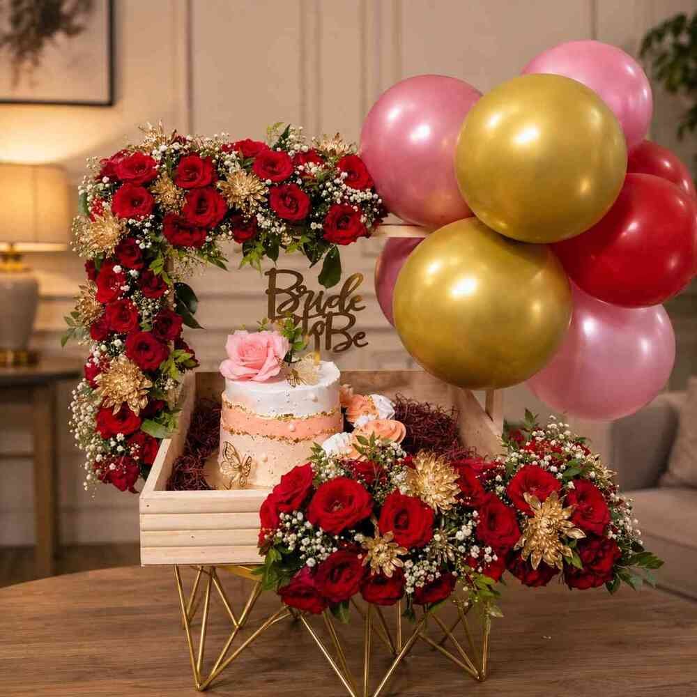 Bridal-Shower-Gift-Box Exquisite bridal shower gifts featuring a cake, roses, and balloons.