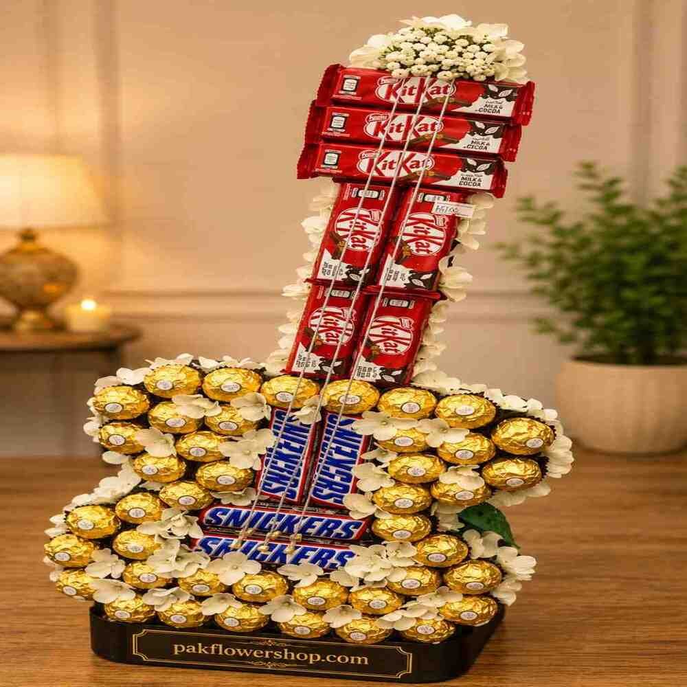 Chocolate-Guitar-Gift-Arrangement Handcrafted chocolate guitar gift arrangement, perfect for unique gift ideas Lahore.