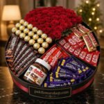 A luxury chocolate and rose arrangement, perfect for gift hampers to Pakistan from UK.