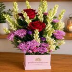 Elegant Floral Box Arrangement is available for fresh flower delivery Lahore.