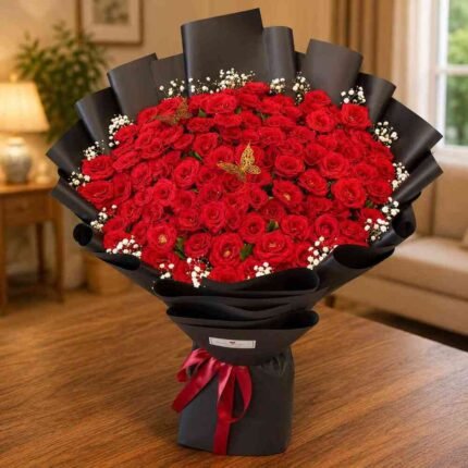 Grand red rose bouquet available for flower bouquet delivery Lahore.