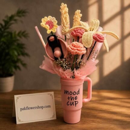 Crochet flower arrangement inside a pink tumbler used for gifts delivery in Lahore