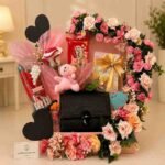 Luxury women's gift hamper with flowers and accessories available in Lahore.