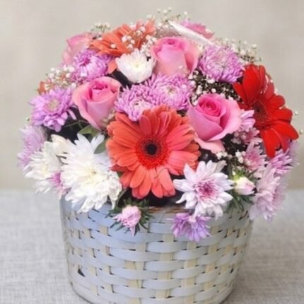 A beautiful floral basket arrangement, provided by the best florist in Lahore.