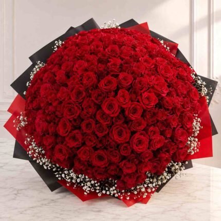 red rose bouquet Lahore with premium red wrapping and baby’s breath