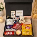 Birthday Gift for Wife Pakistan with teddy bear, mug, chocolates, and snacks