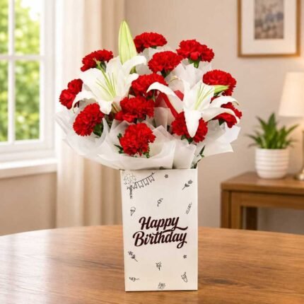 Birthday flower box Lahore with red carnations and white lilies