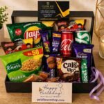 Birthday Snack Hamper Pakistan with chocolates, snacks, drinks, and cookies.