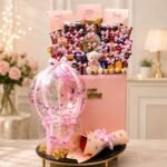 Birthday gift hamper Pakistan with chocolates, teddy bear, balloons, and roses
