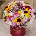 Luxury flower box Lahore with roses, sunflowers, and fresh seasonal flowers.