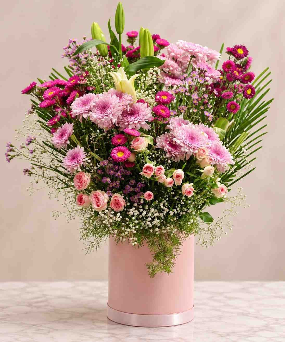 Fresh Flower Arrangement Lahore Fresh flower arrangement Lahore with pink chrysanthemums, lilies and roses
