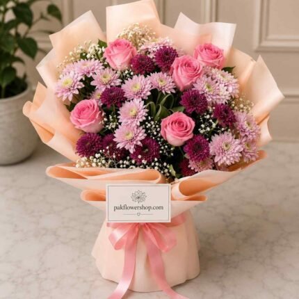 Fresh bouquet Lahore with pink roses and seasonal flowers.