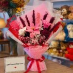 Handmade Flower Bouquet Lahore with pink crochet flowers and luxury wrapping.
