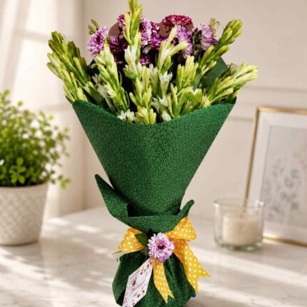 Flower bouquet Lahore with green wrapping and purple white flowers