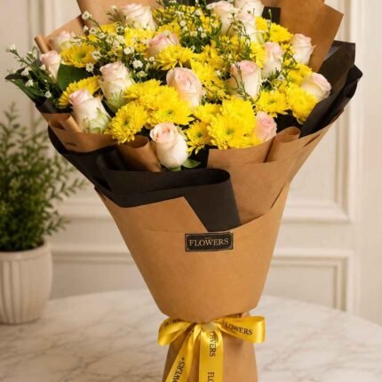 yellow flower bouquet with blush roses
