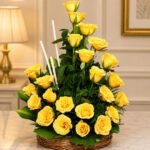yellow rose flower basket with lush greenery