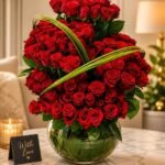 Elegant rose arrangement Pakistan with fresh red roses displayed in a premium glass vase.