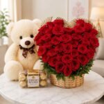 Romantic gift hamper Lahore with red roses teddy bear and chocolates.