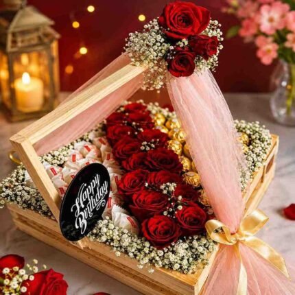 Elegant flower hamper Pakistan with fresh red roses, premium chocolates, and luxury decorative wrapping.