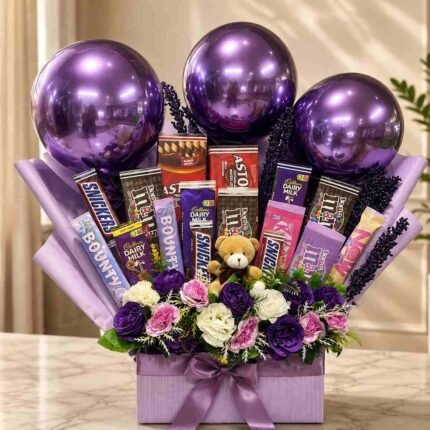 Chocolate gift bouquet Lahore with assorted chocolates, flowers, balloons, and teddy bear