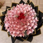 Cash bouquet Lahore with premium wrapping and fresh red roses.