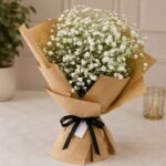 Baby breath bouquet Lahore with fresh white gypsophila flowers and kraft wrapping.