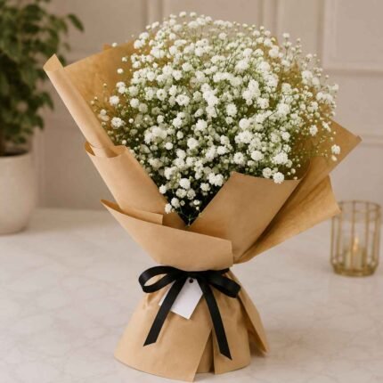 Baby breath bouquet Lahore with fresh white gypsophila flowers and kraft wrapping.