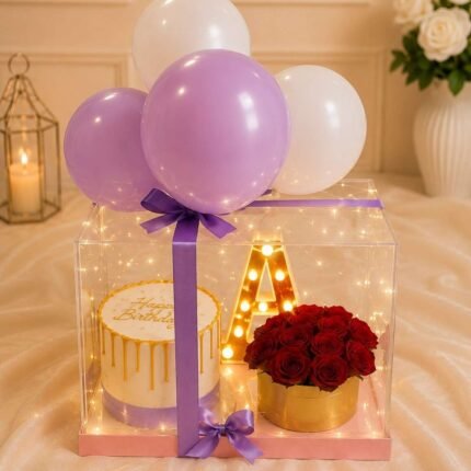 Transparent box with pastel balloons and red roses for the best gift delivery Lahore