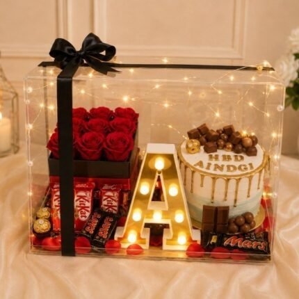 Clear gift box with a letter light and chocolates to send gifts to Pakistan