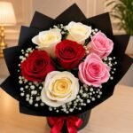 Mixed flower bouquet Lahore with red, pink, and ivory roses