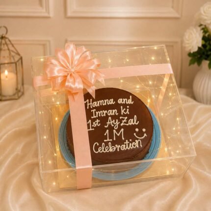 Transparent gift box with a custom message cake for people who want to send gifts to Lahore