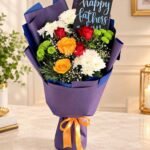 Flower gifts Lahore featuring a vibrant bouquet of roses and chrysanthemums for Dad