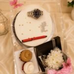 birthday gift box Pakistan with watch cake cupcakes and flowers