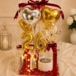 26th Birthday Gift Lahore with golden balloons, cake and lights
