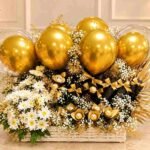 Gift Delivery Pakistan with flowers, chocolates, and golden balloons