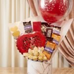 Heart chocolate balloon bucket arrangement to send gifts to pakistan