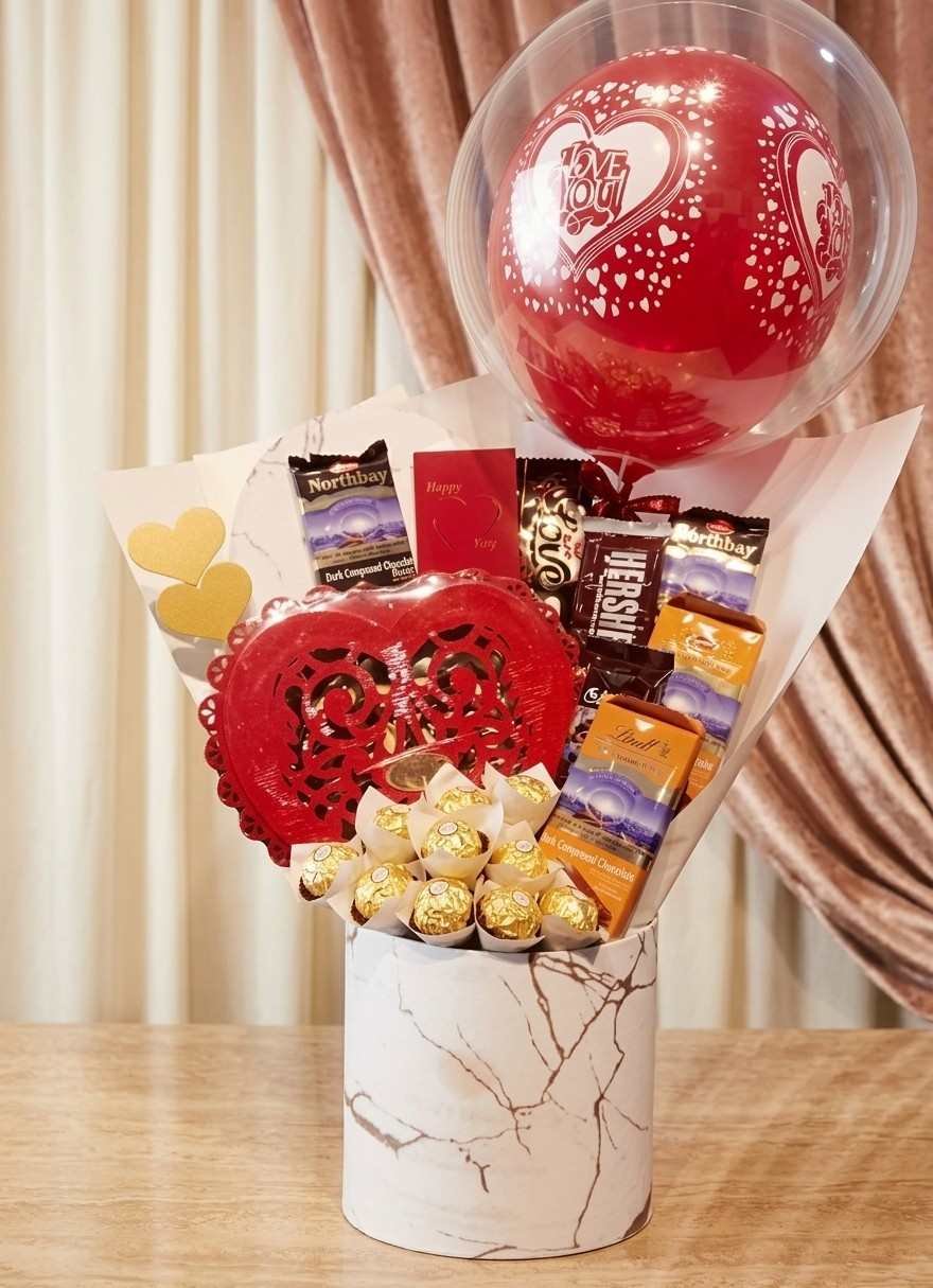 Send Gifts To Pakistan Heart Balloon Bucket Heart chocolate balloon bucket arrangement to send gifts to pakistan