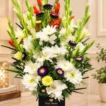Mixed flower arrangement Lahore with white chrysanthemums and purple flowers