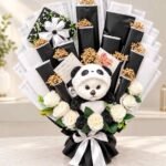 Panda gift bouquet with roses and wrapped treats