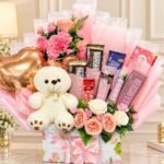 Birthday Gift Lahore with pink flowers teddy bear chocolates and heart balloon