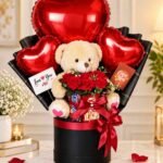 Teddy gift Lahore with red roses, chocolates and heart balloons