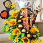 Sunflower Twix chocolate arrangement for same day flower delivery lahore