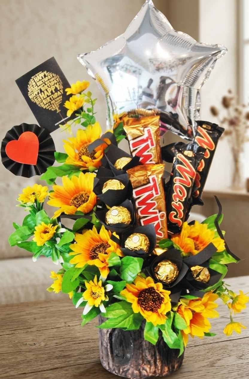 Same Day Flower Delivery Lahore Sunflower Chocolate Pot Sunflower Twix chocolate arrangement for same day flower delivery lahore